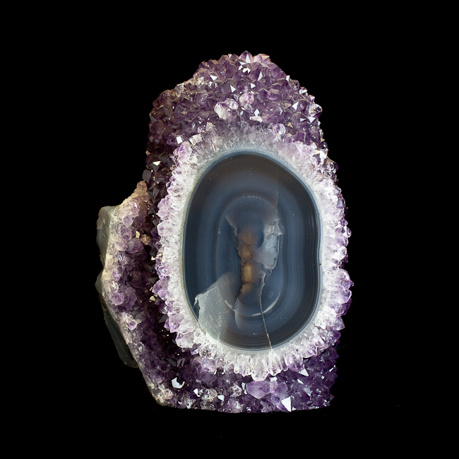 Amethyst stalactite formation with exposed polished agate.  Brazil