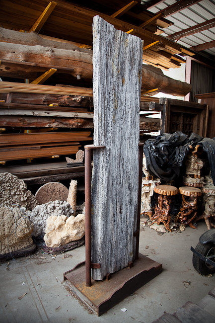 8' tall petrified specimen on welded iron stand.  Montana